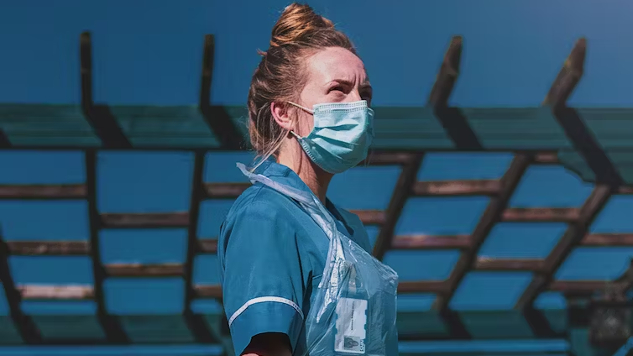 The What, When, and the Why Not of Antibiotic Use medical staffer wearing a mask